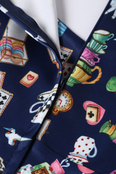 Close up view of Alice In Wonderland Print Sleeved Dress in Navy Blue