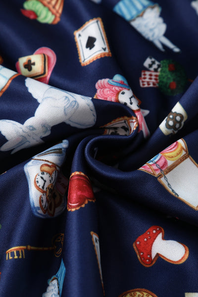 Close up view of Alice In Wonderland Print Sleeved Dress in Navy Blue