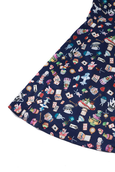 Close up view of Alice In Wonderland Print Sleeved Dress in Navy Blue