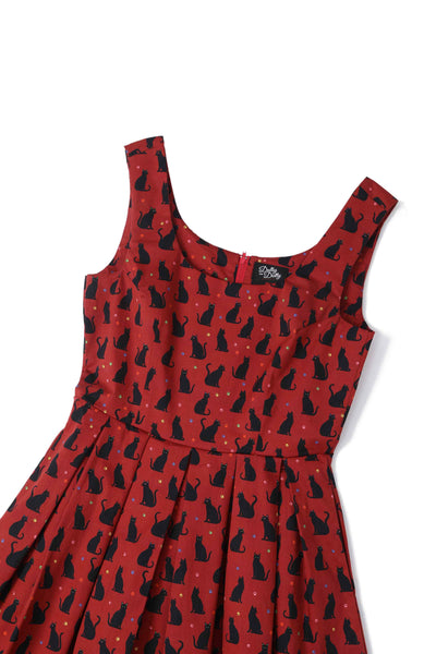 The top of Amanda Black Cat Swing Dress In Burgundy