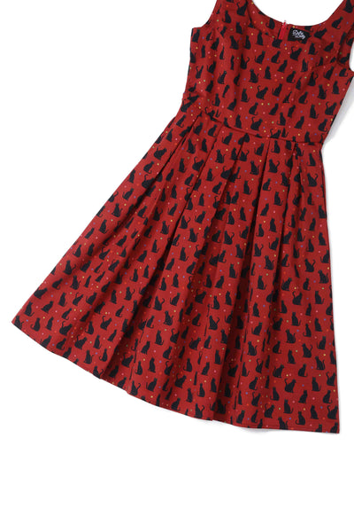 Close up view the skirt of Amanda Black Cat Swing Dress In Burgundy