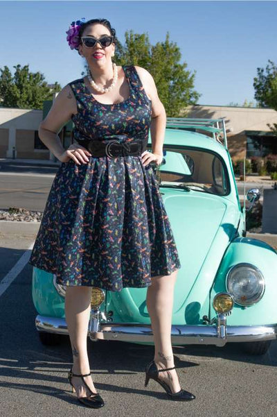 A model wearing an Amanda Dinosaur In Space Flared Dress