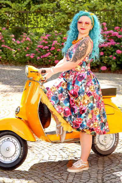 A model wearing an Amanda Disco Ball Swing Dress