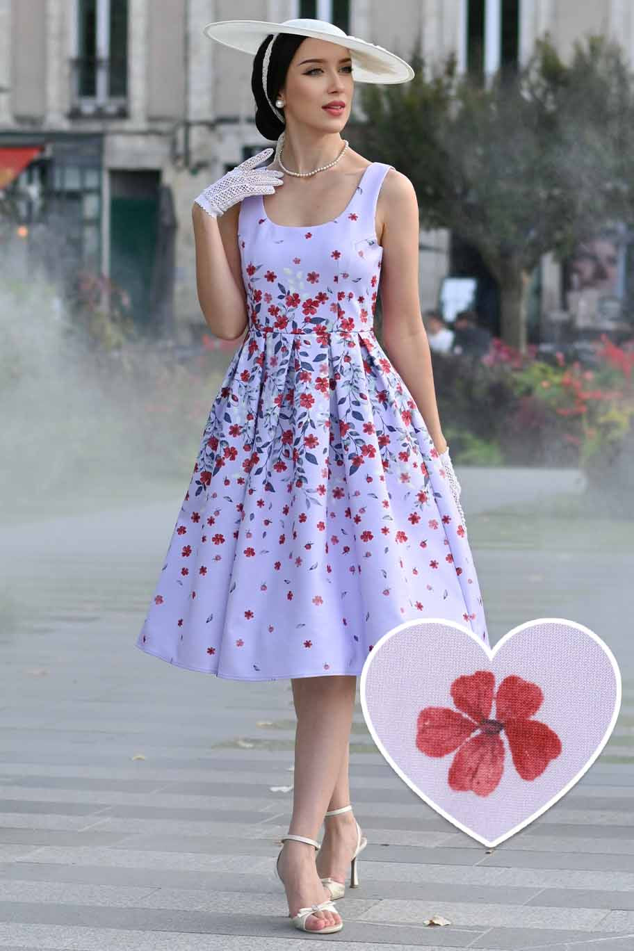 A model wearing an Amanda Lilac Falling Flower Swing Dress