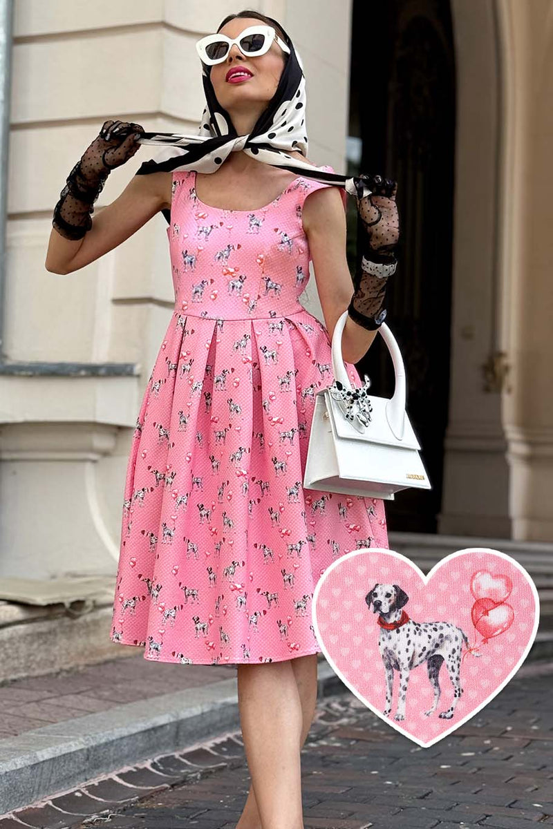 A women wearing an Amanda Pink Dalmatian Flared Dress