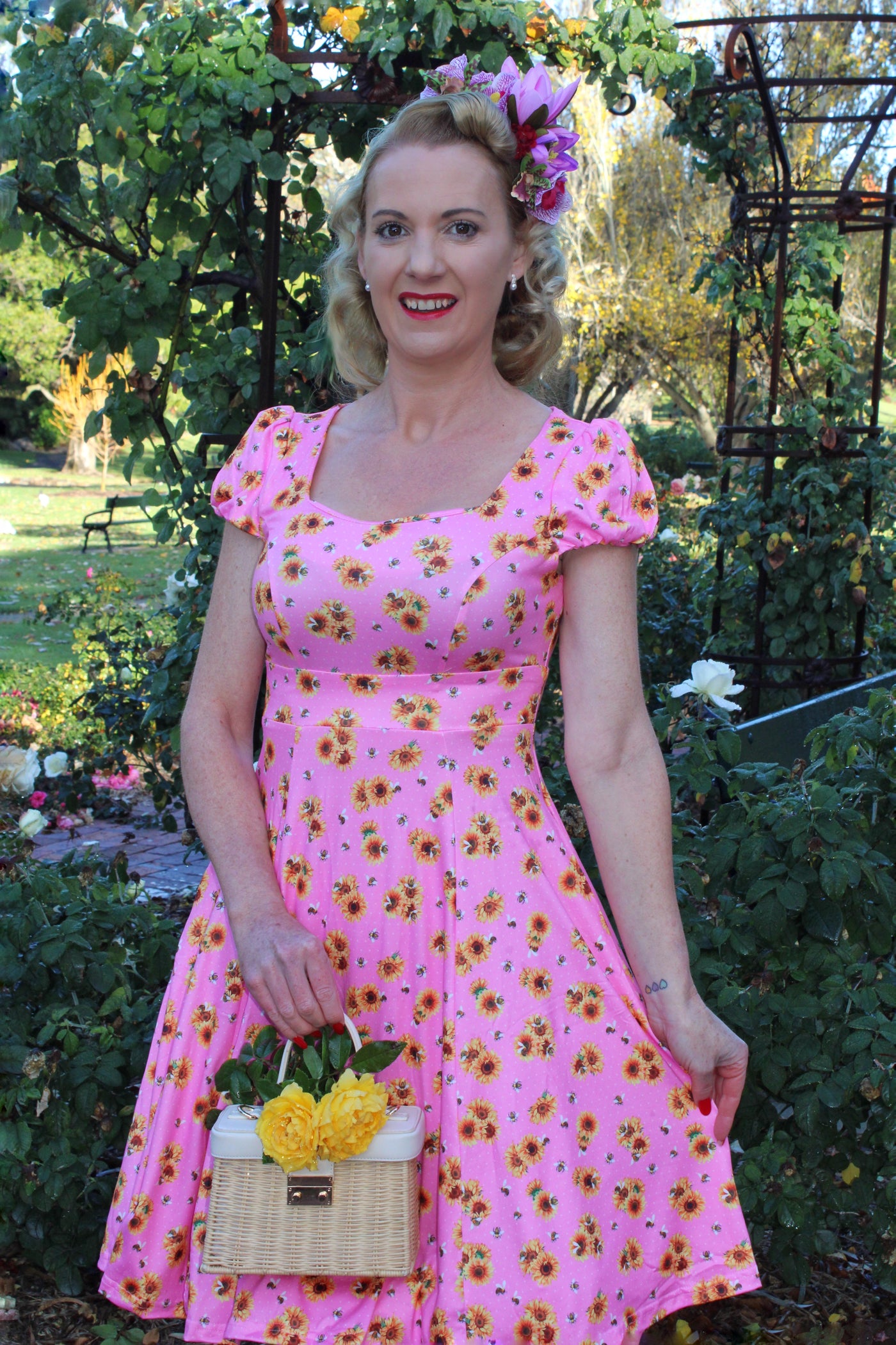 Model photo of Pink Cap Sleeved Dress with Sunflowers & Bees