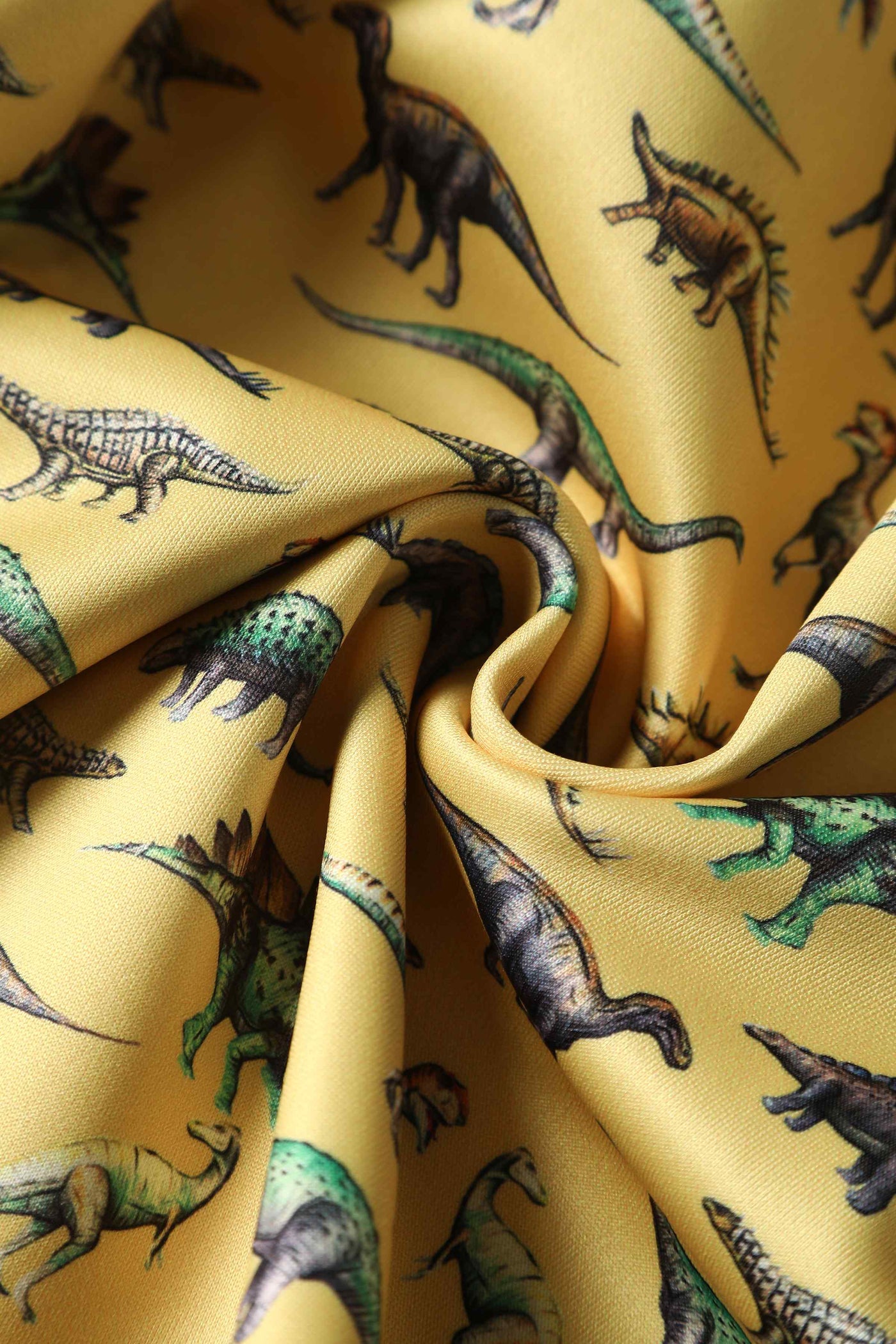 Close up View of Antique Dinosaur Flared Dress in Yellow
