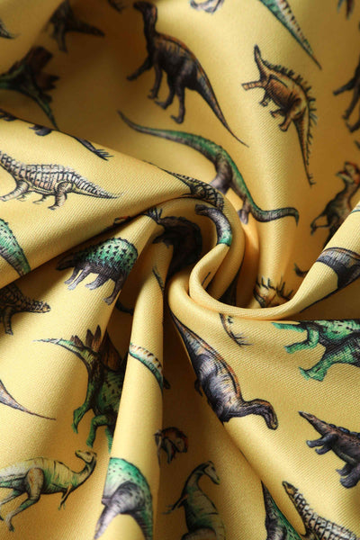 Close up View of Antique Dinosaur Flared Dress in Yellow