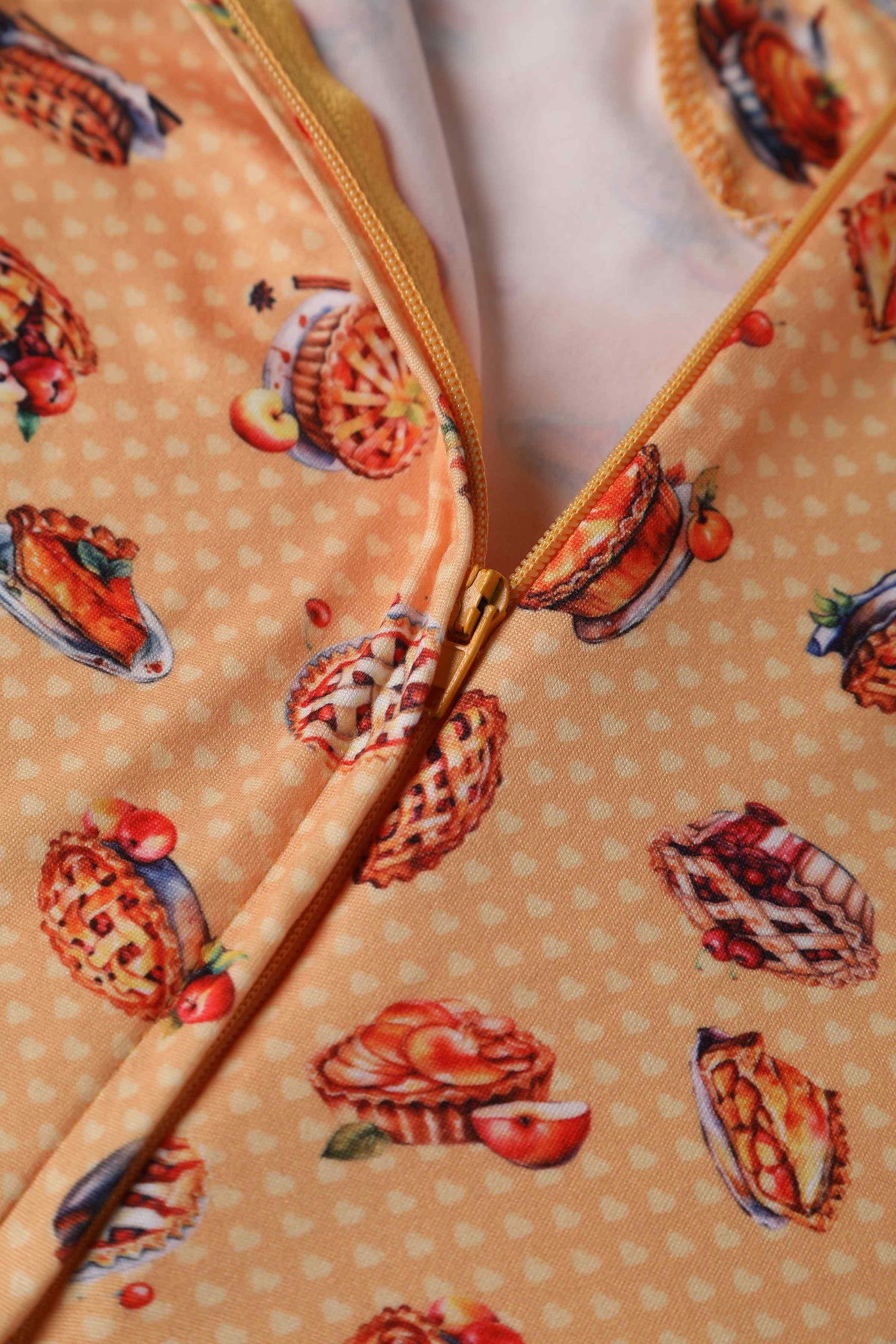 Close up View of Apple Pie Short Sleeved Dress in Orange