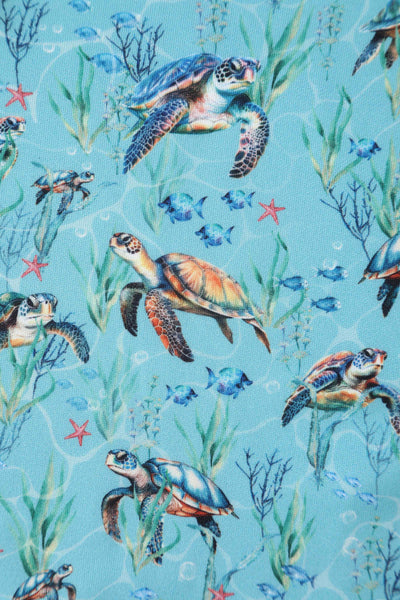 Close up view of Aquamarine Turtle Print Flared Dress