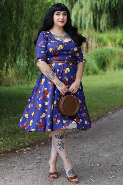 A lovely model wearing a Scarlette Dark Blue Floral Midi Dress