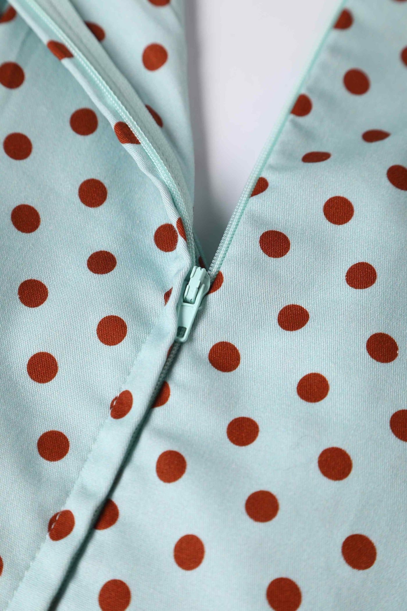 Close up View of Baby Blue and Red Polka Dot Off Shoulder Dress