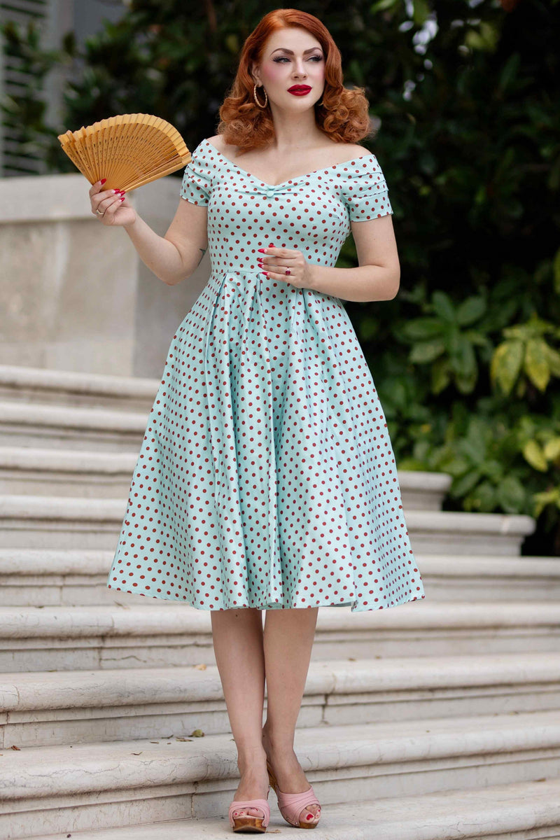 Blue and red polka dot dress store