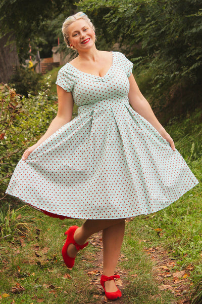 A model wearing a Baby Blue and Red Polka Dot Off Shoulder Dress