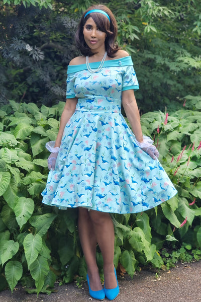 A model wearing a Baby Blue Whale Swing Dress
