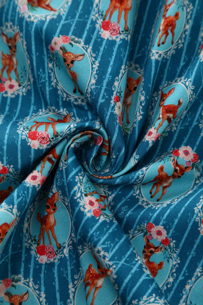 Close up  view of Baby Deer Midi Shirt Dress In Blue