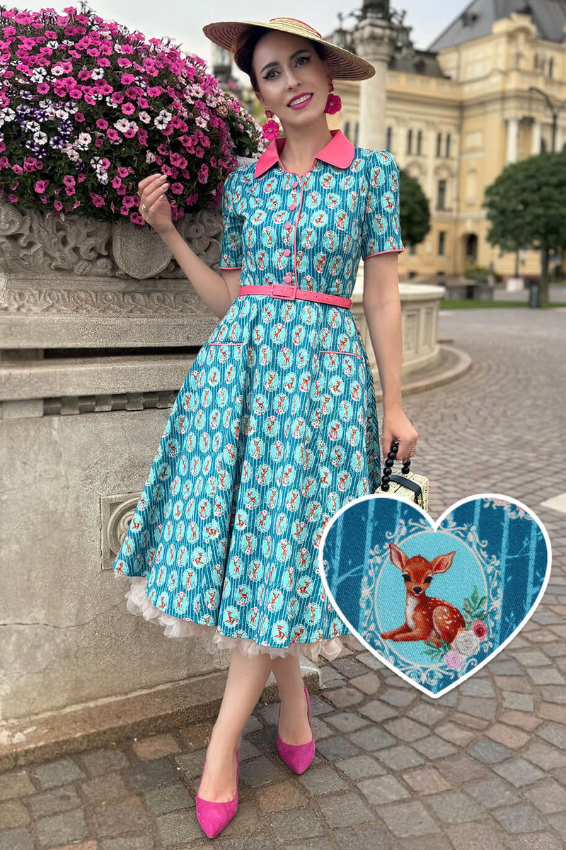 A model wearing a Baby Deer Midi Shirt Dress In Blue