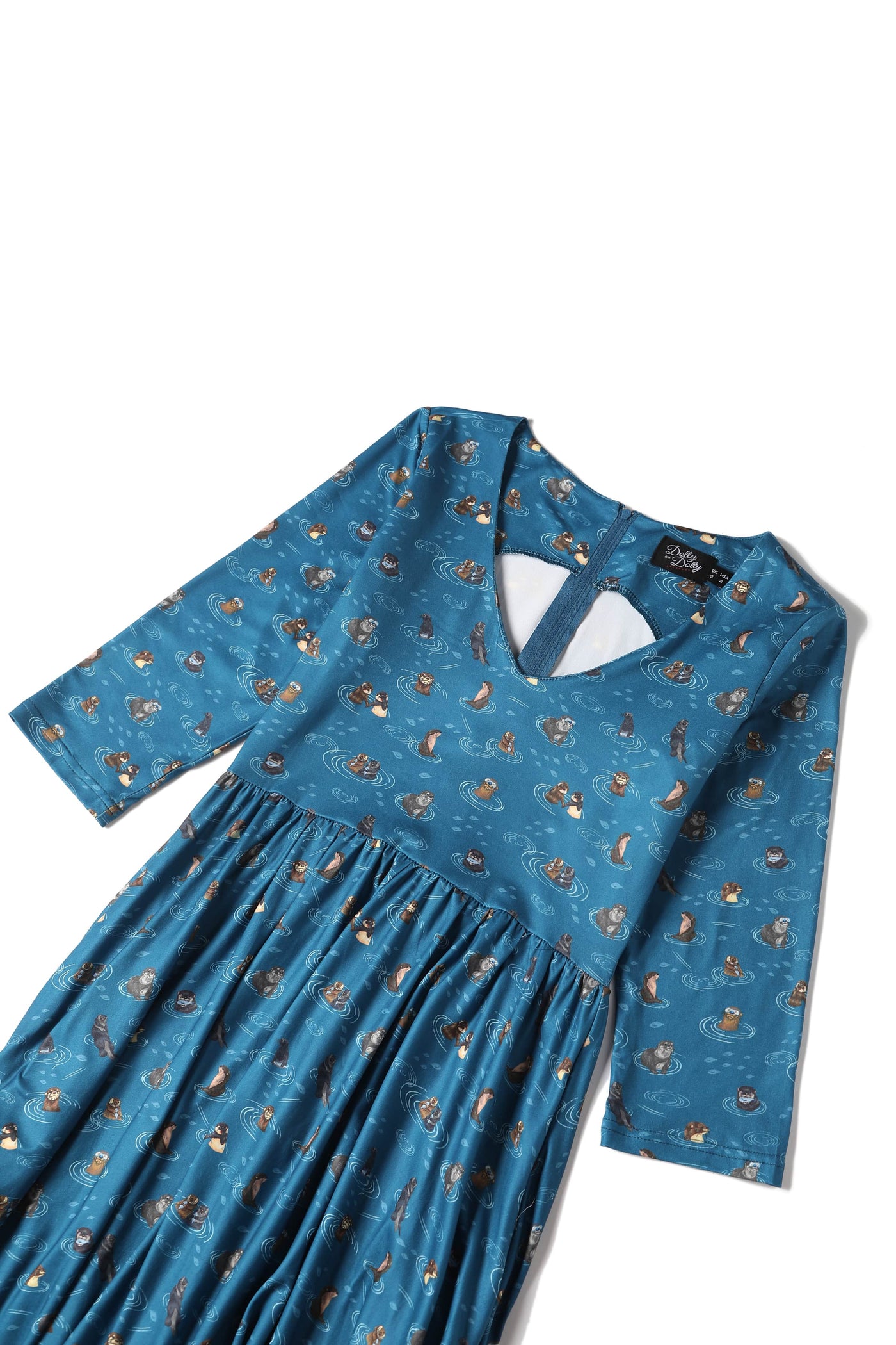   billie long sleeved blue otter family dress bodice close up