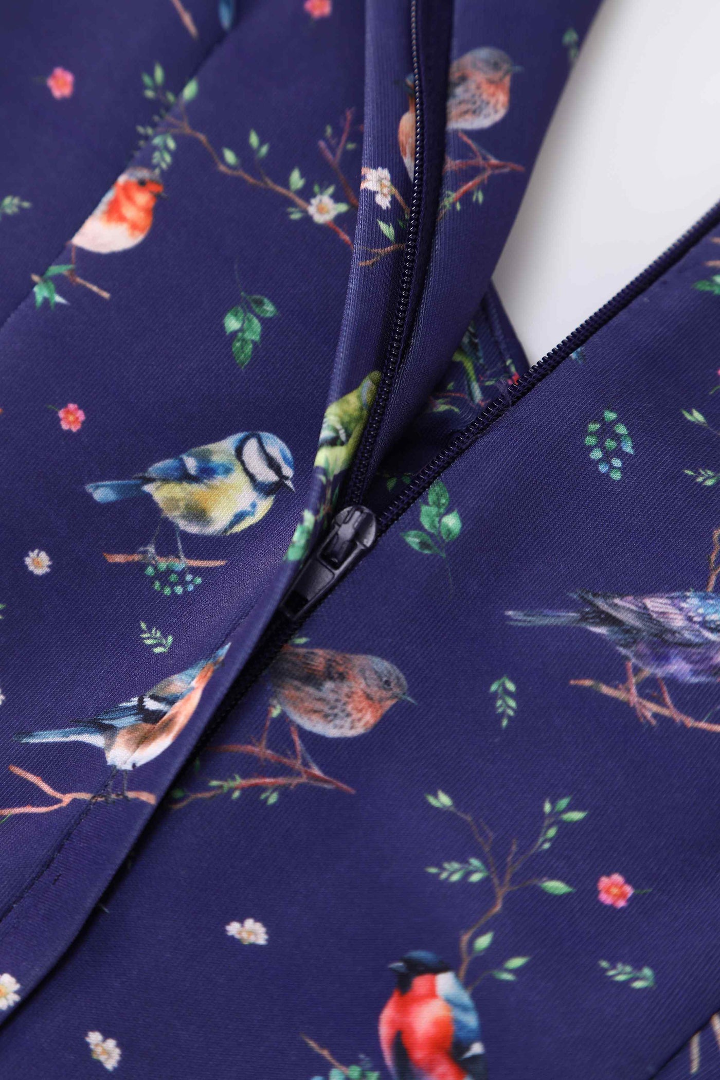 Close up view of Bird Garden Off Shoulder Dress In Navy Blue