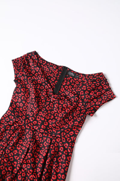 Close up view of Black & Red Cheetah Print Off Shoulder Dress