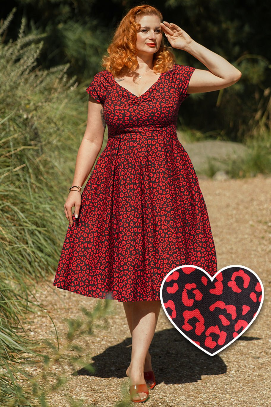 A model wearing a Black & Red Cheetah Print Off Shoulder Dress