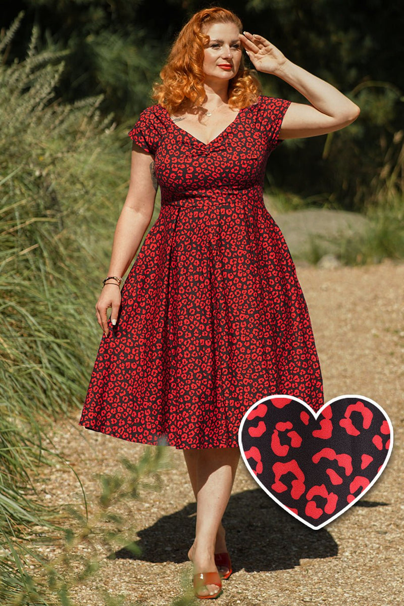 A model wearing a Black & Red Cheetah Print Off Shoulder Dress