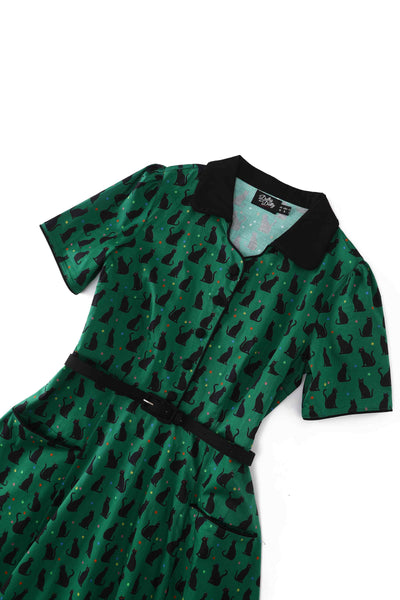 Close up view of Black Cat Midi Shirt Dress In Green