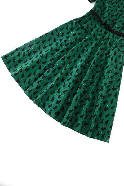 Close up view of Black Cat Midi Shirt Dress In Green