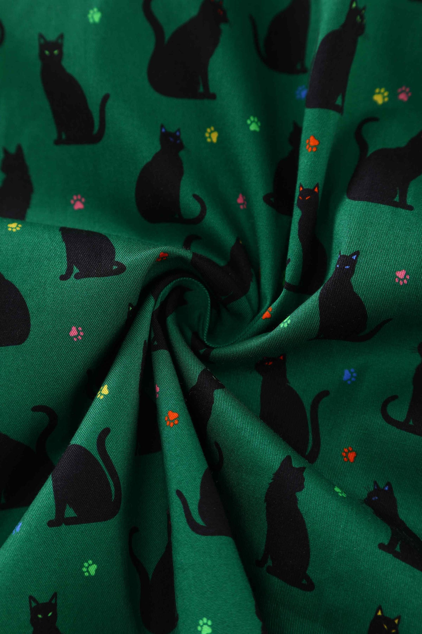Close up view of Black Cat Midi Shirt Dress In Green