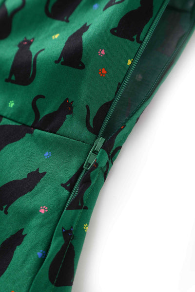Close up view of Black Cat Midi Shirt Dress In Green