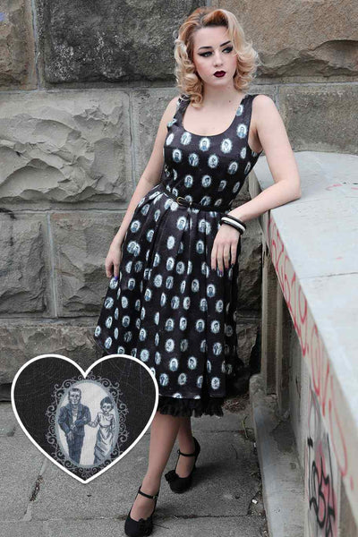 A lady wearing a Black Frankenstein Monster Print Swing Dress