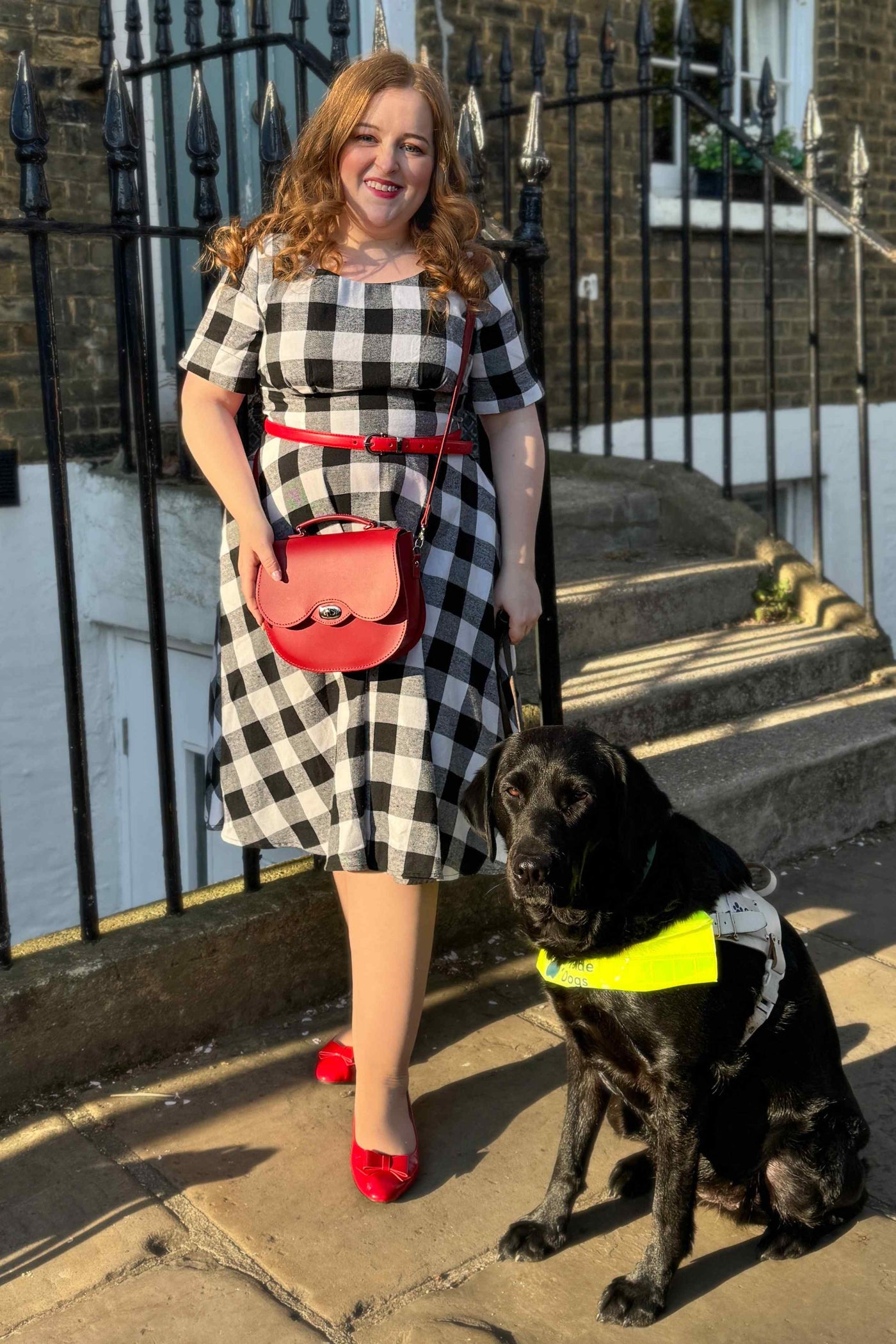A lady wearing a Black Gingham Check Flared Dress