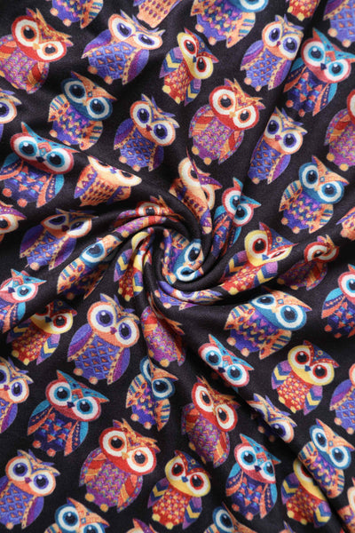 Close up view of Black Midi Dress in Aztec Owl Print