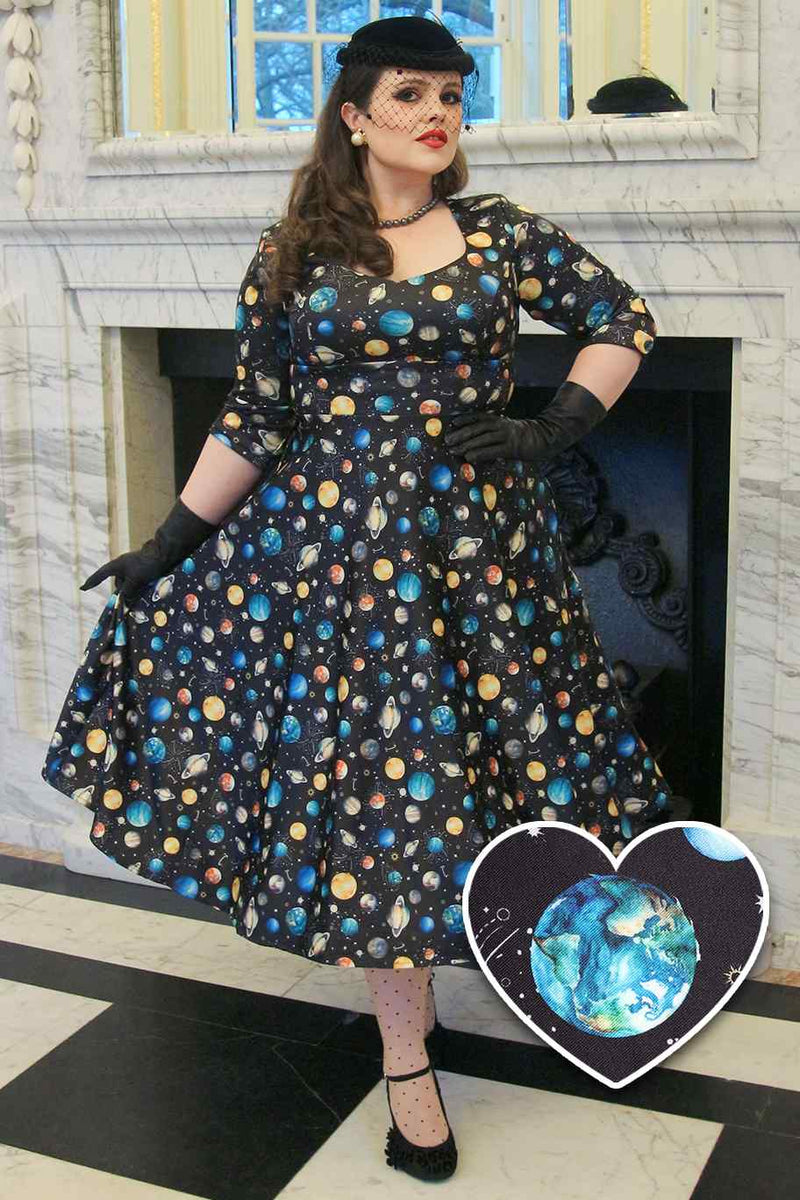 Customer wears our Black space and Planet print  Dress