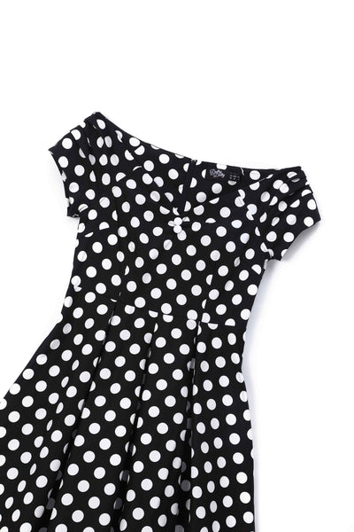 Close up view of Black Polka Dot Off Shoulder Dress
