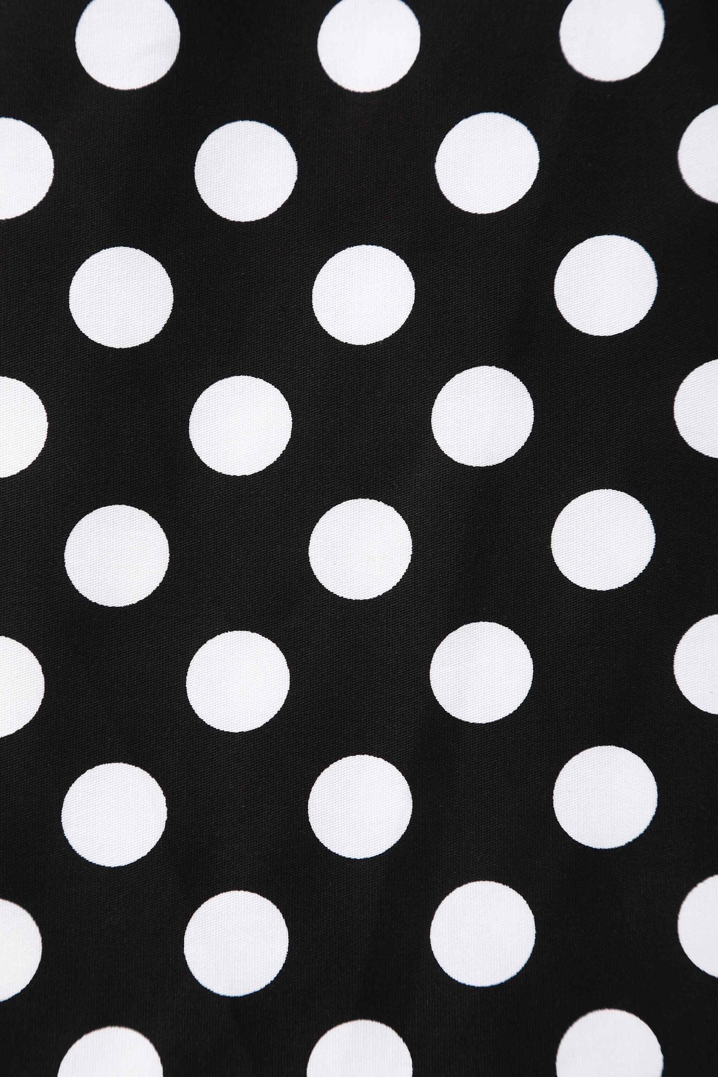 Close up view of Black Polka Dot Off Shoulder Dress