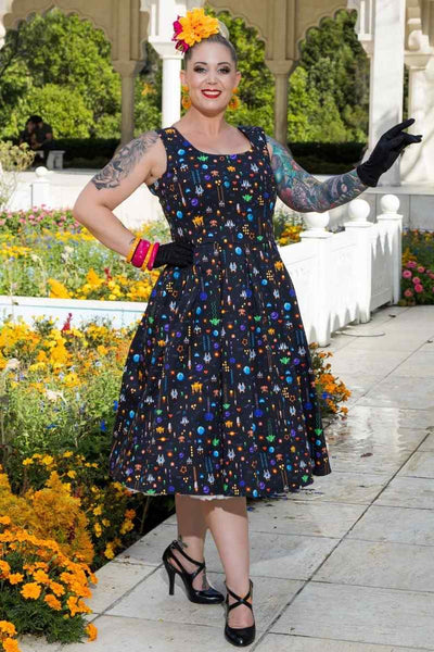 A model wearing a Black Retro Arcade Game Flared Dress