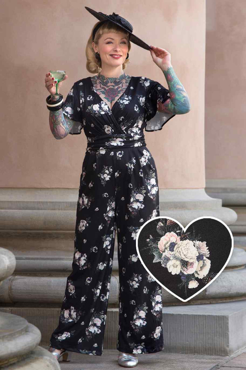 A model wearing Black Rose Butterfly Sleeved Jumpsuit