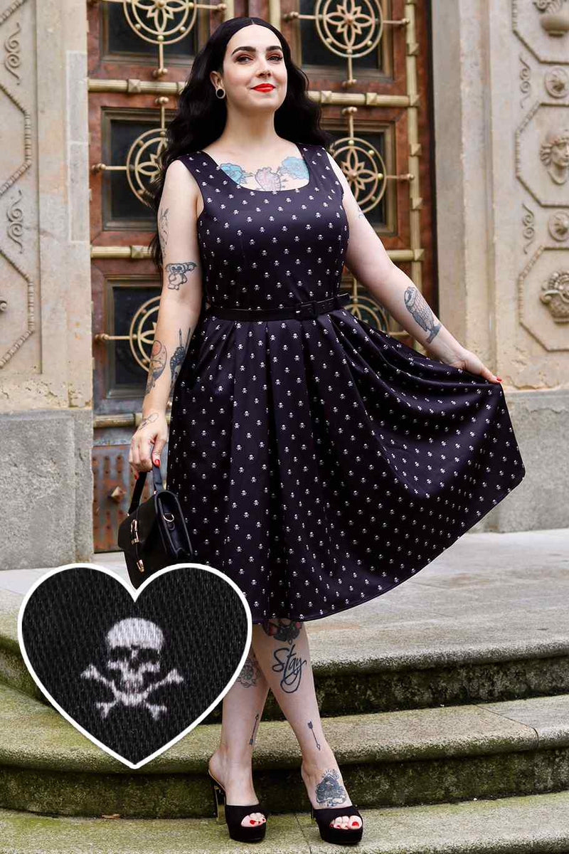 A model wearing a Black Skull Swing Dress