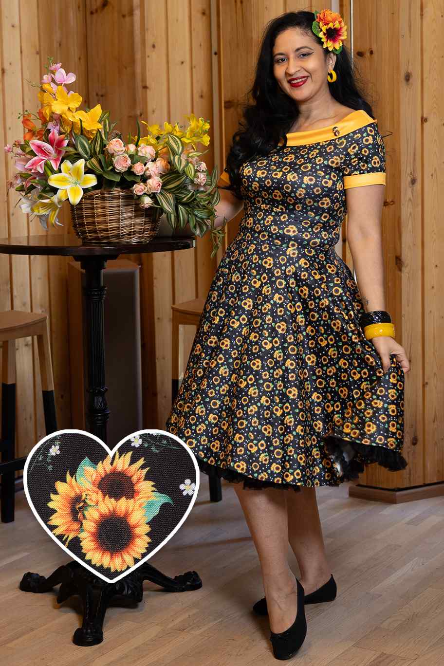 A model wearing a Black Sunflower Swing Dress