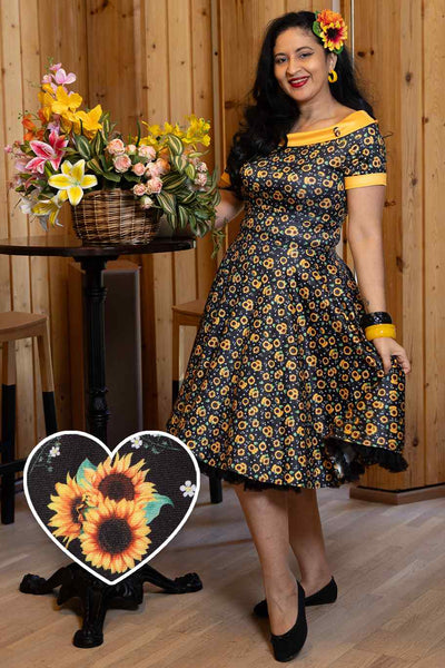 A model wearing a Black Sunflower Swing Dress