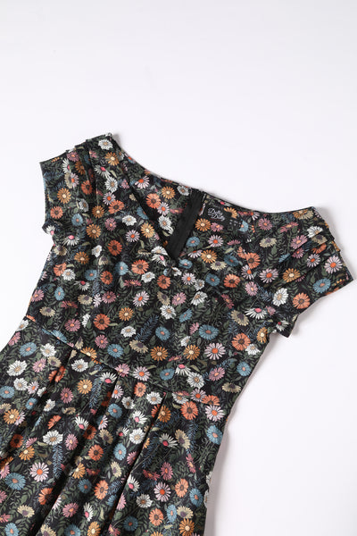 Close up view of Black Wildflower Off Shoulder Dress