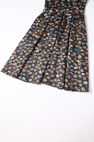 Close up view of Black Wildflower Off Shoulder Dress