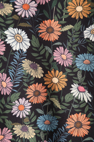 Close up view of Black Wildflower Off Shoulder Dress