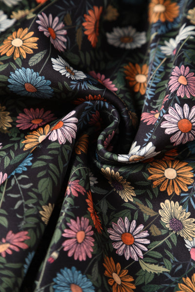 Close up view of Black Wildflower Off Shoulder Dress