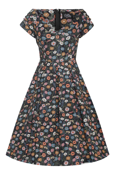 A lady wearing a Black Wildflower Off Shoulder Dress