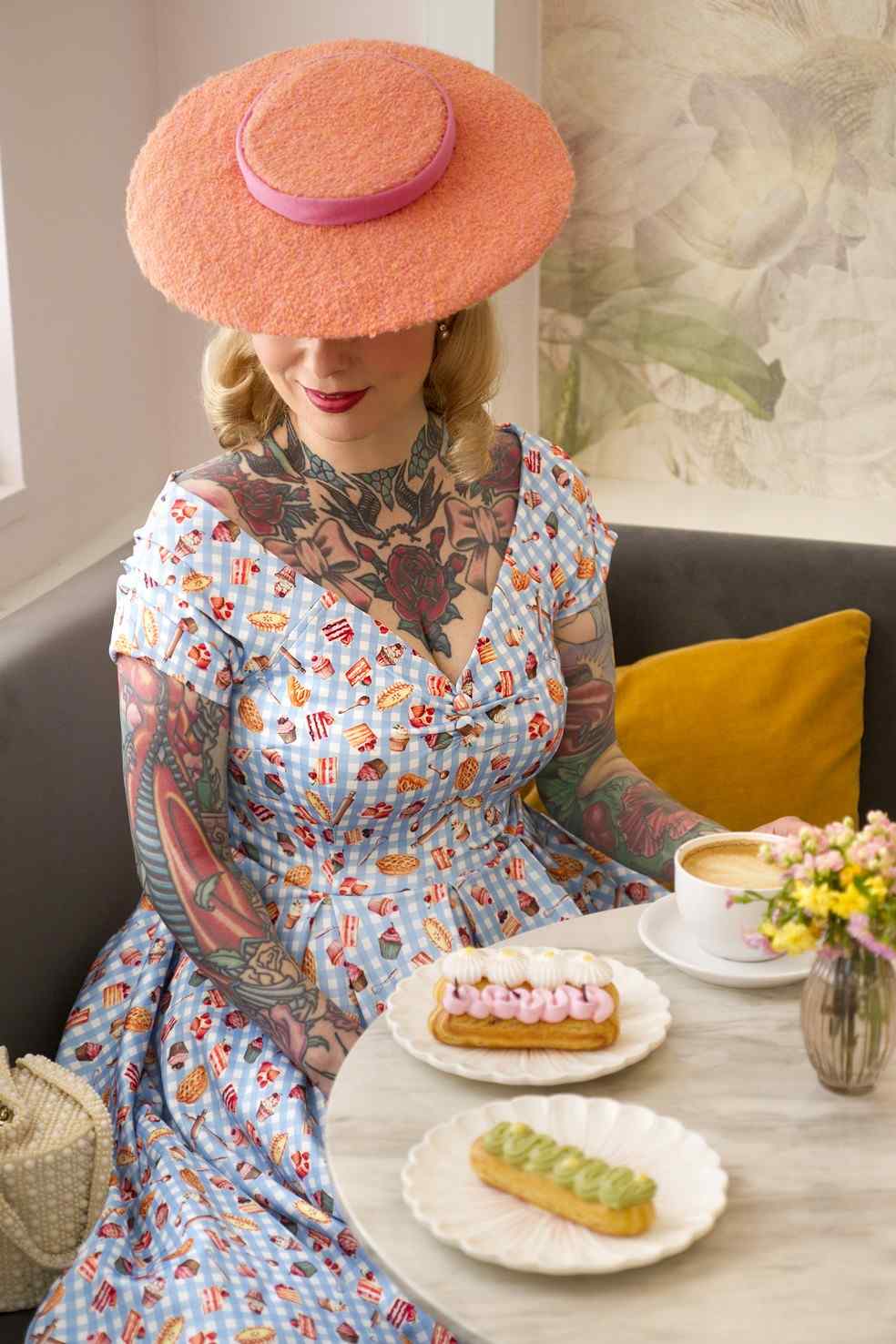 A model wearing Blue Gingham Off Shoulder Dress In Baking Print
