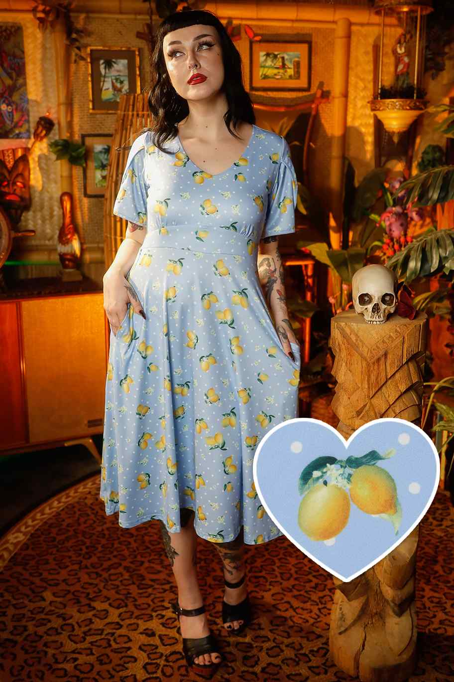 A model wearing a Blue Lemon Petal Sleeved Tea Dress