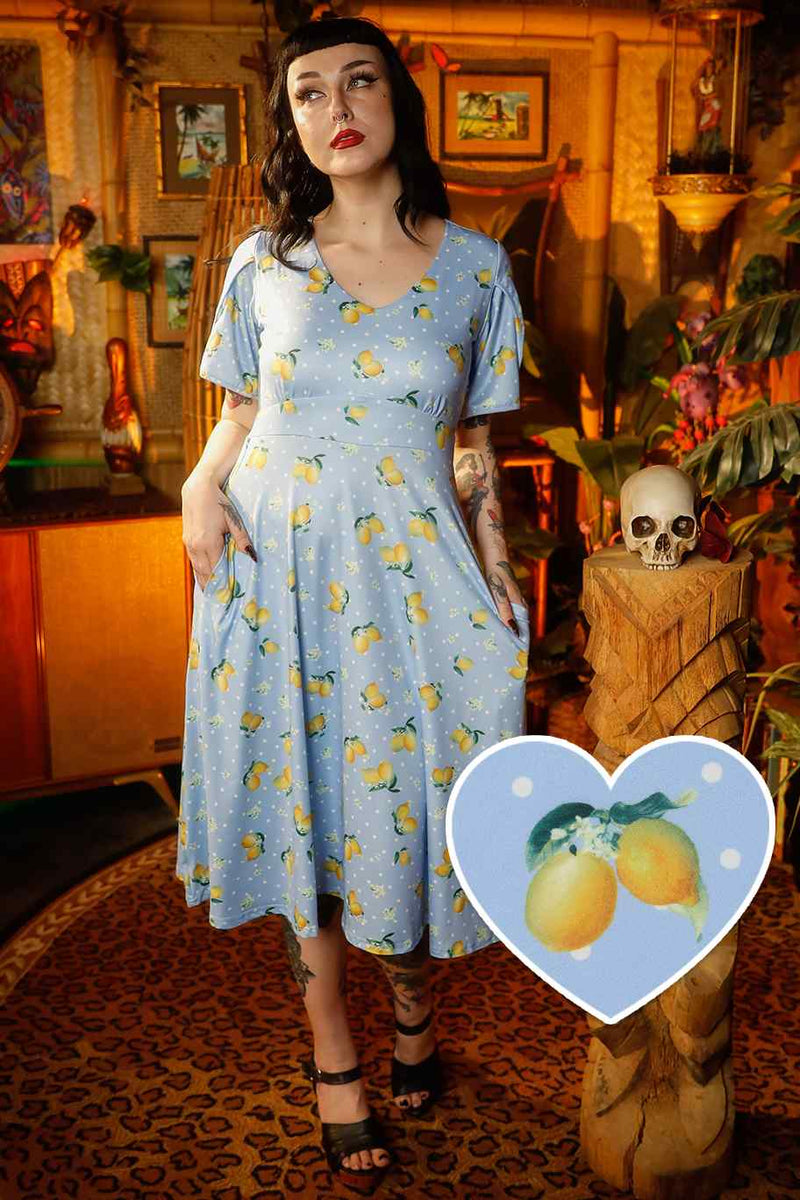 A model wearing a Blue Lemon Petal Sleeved Tea Dress