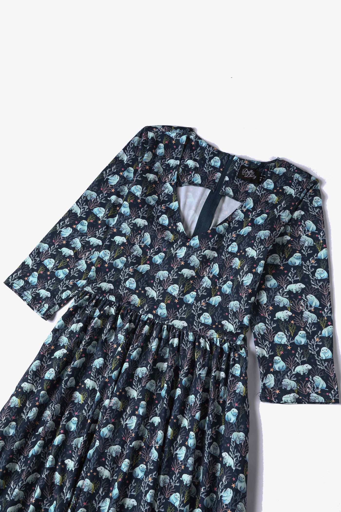 Close up View of Blue Manatee Long Sleeved Swing Dress in Navy